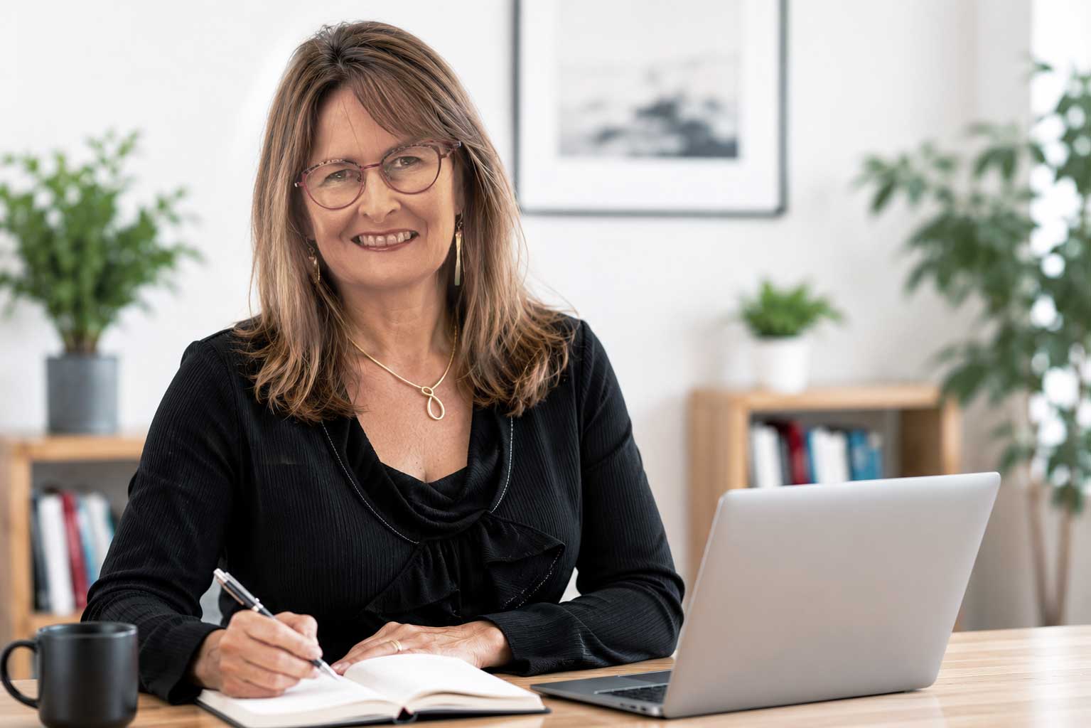 Tracey meeting with a client in Auckland